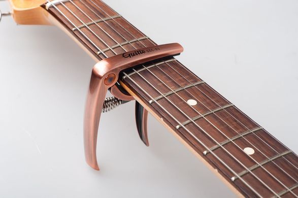 Каподастр GUITTO GGC-03 Bronze